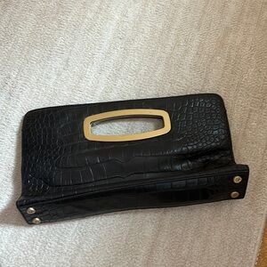 Donald J Piner oversized clutch